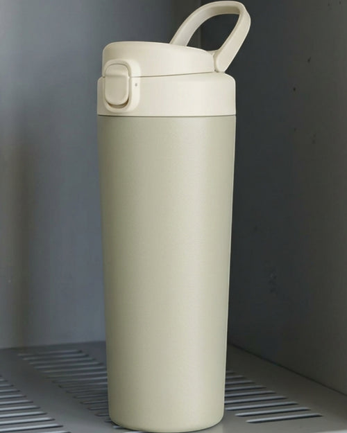 Mokfi Protected-Straw Flip-Lid Double-Wall Travel Tumbler 20 oz Sage Cream - Lifestyle view